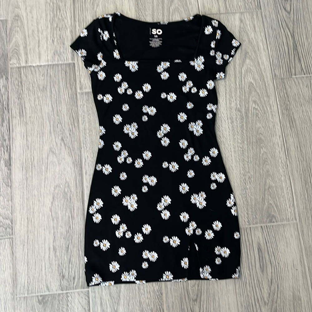 Ladies black dress with white daisy design